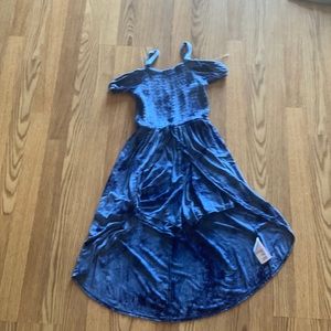 A blue one piece jumpsuit with a train skirt and shorts